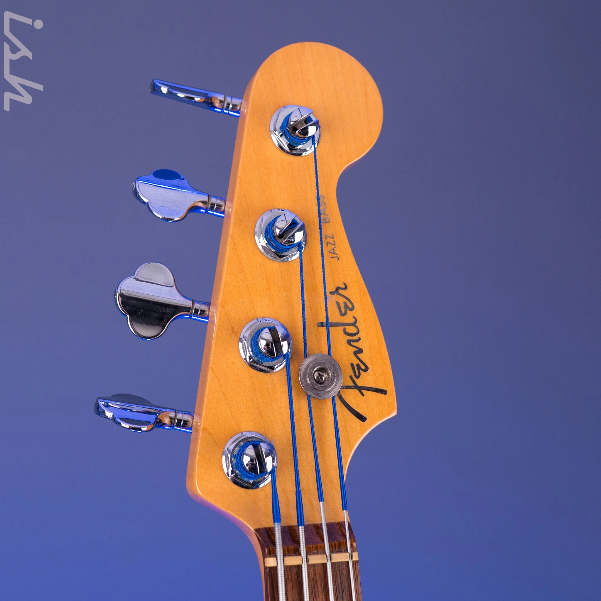 1999 Fender American Deluxe Jazz Bass Fretless 4-String Transparent Crimson Red - Image 10