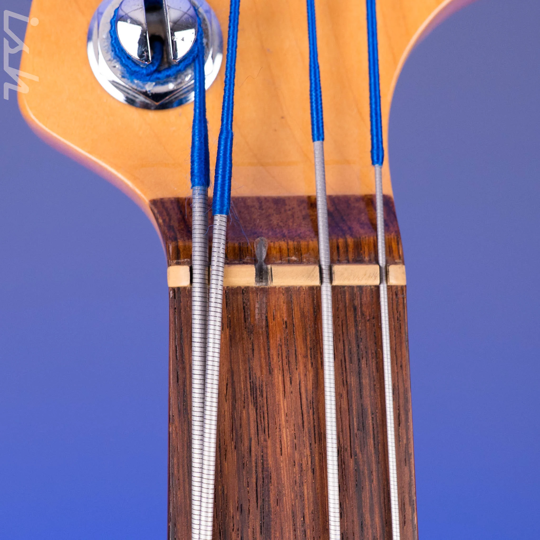 1999 Fender American Deluxe Jazz Bass Fretless 4-String Transparent Crimson Red - Image 12