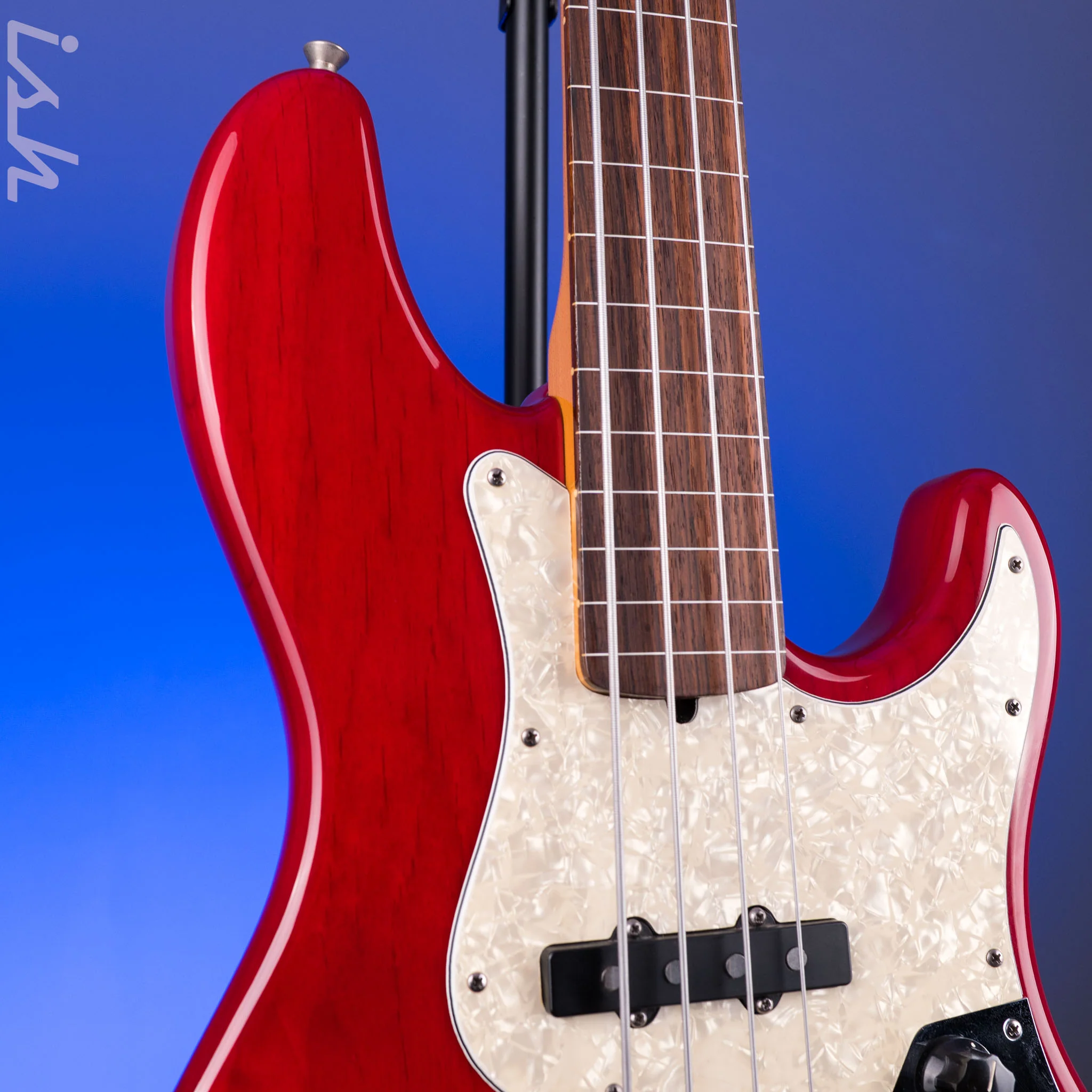 1999 Fender American Deluxe Jazz Bass Fretless 4-String Transparent Crimson Red - Image 4
